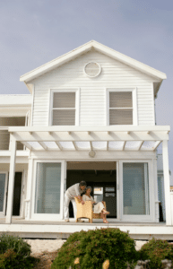 Retired Pair on Porch of Beach House
